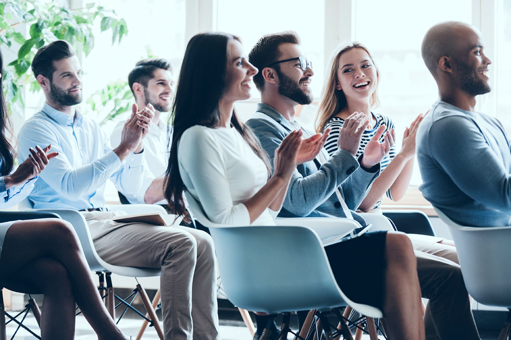 Audience clapping at an event