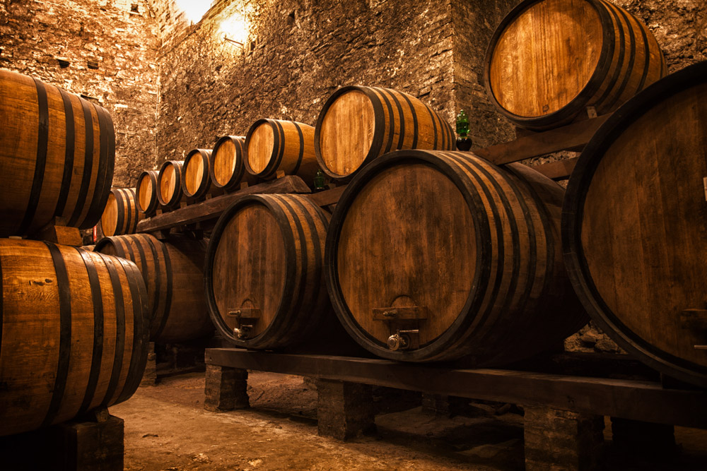 Whisky barrels maturing in a cellar