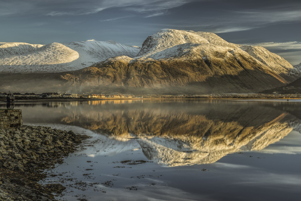 Ben Nevis reflecting in a still loch