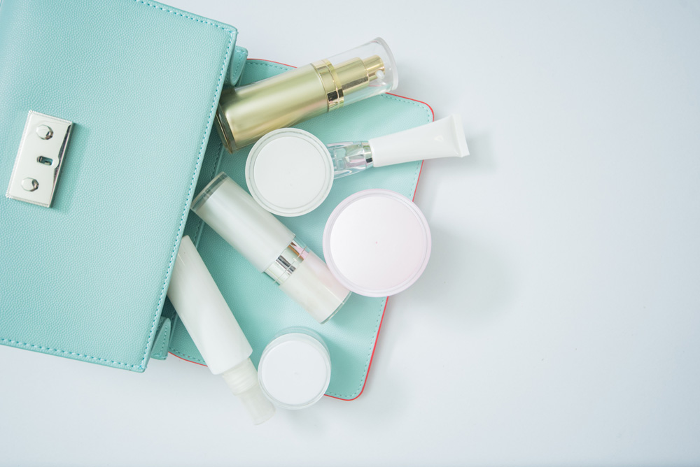 Cosmetic bag filled with skincare products