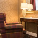 An armchair and desk at Kingsmills Hotel, Inverness