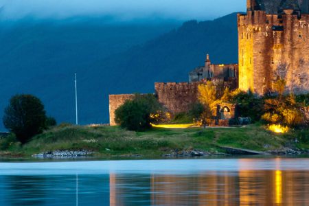 Elieen Donan castle lit up at night