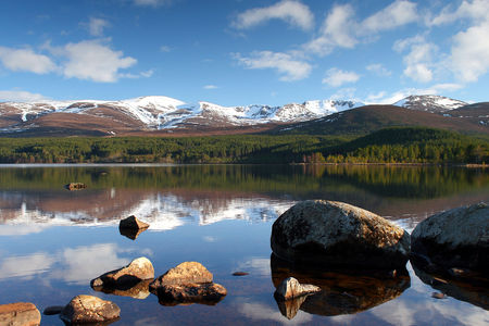 The Cairngorm Mountains with a loch in the foreground