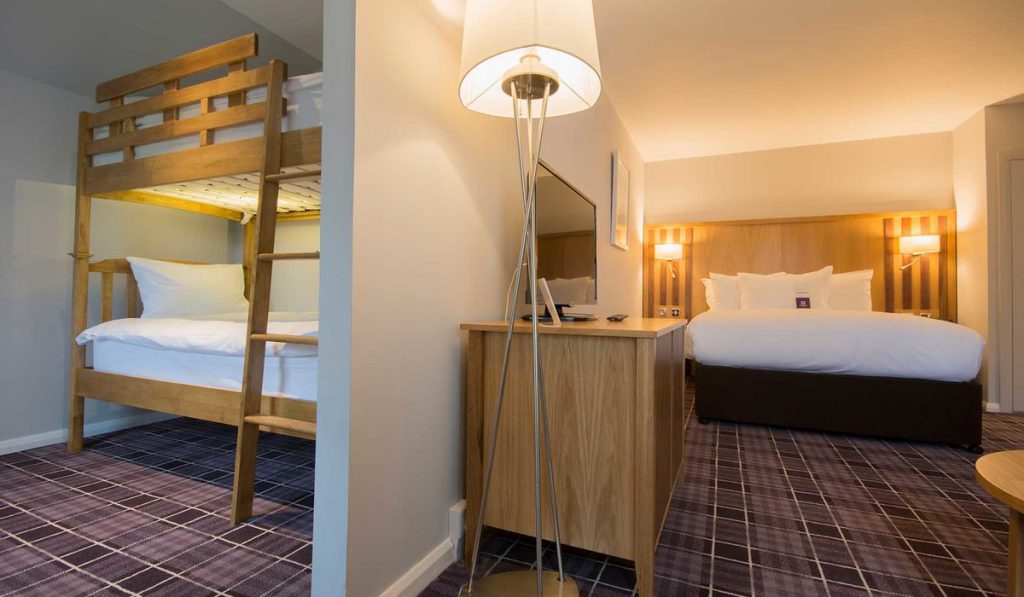 Double bed and bunk beds in a Luxury Family Room in Kingsmills Hotel