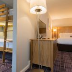 Double bed and bunk beds in a Luxury Family Room in Kingsmills Hotel