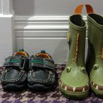 A pair of child's wellies and shoes outside a Luxury Family Room in Kingsmills Hotel