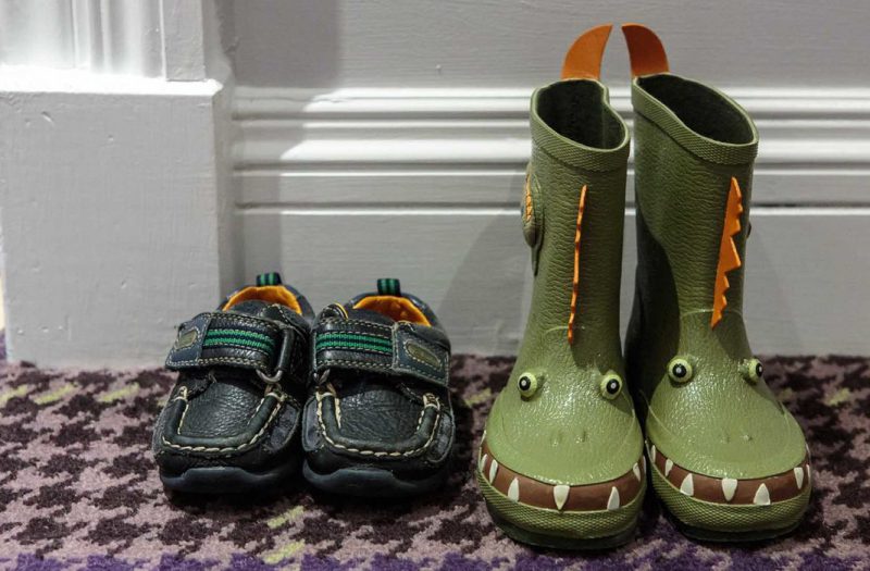 A pair of children's shoes and wellies outside a Retreat Family Room at Kingsmills Hotel