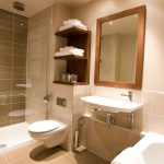 A bathroom in a Cocoon Room at Kingsmills Hotel