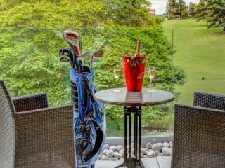1524241720Retreatgallery2 A balcony with a golf course in the background in a Retreat Room at Kingsmills Hotel