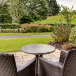 A view from a patio outside a Retreat Room at Kingsmills Hotel