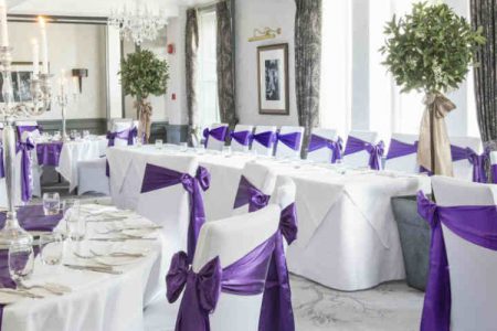 A room set up for a wedding at Kingsmills Hotel