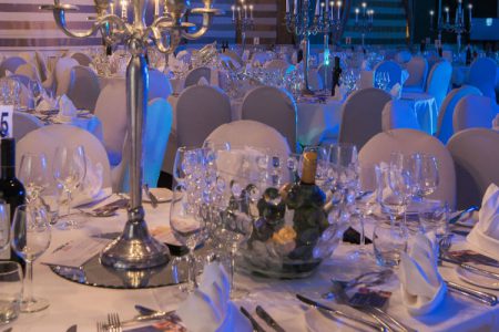 A room set up for dining at an event at Kingsmills Hotel