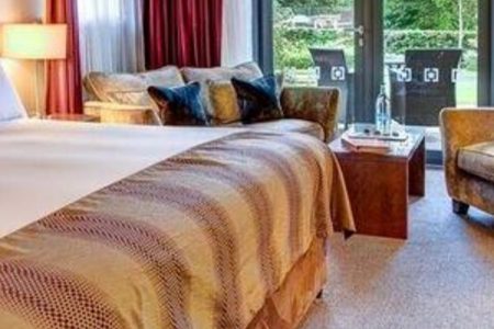 A close of of a bed in a Kingsclub retreat room
