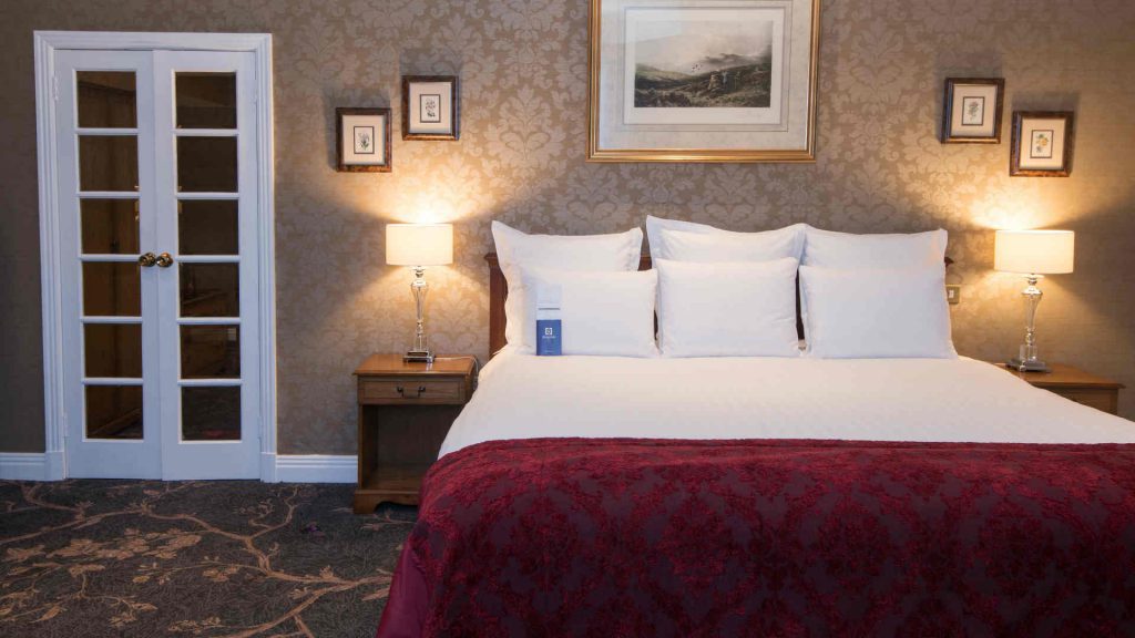 A bed in the accessible rooms at Kingsmills Hotel, Inverness