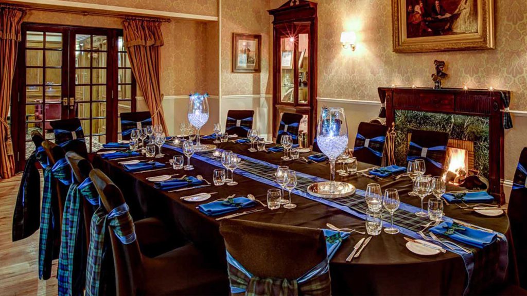 The Adams Room dressed in tartan awaiting guests for dinner at Kingsmills Hotel, Inverness