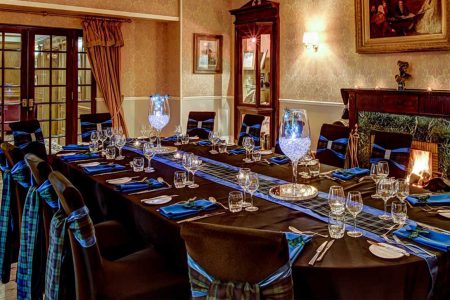 The Adams Room dressed in tartan awaiting guests for dinner at Kingsmills Hotel, Inverness