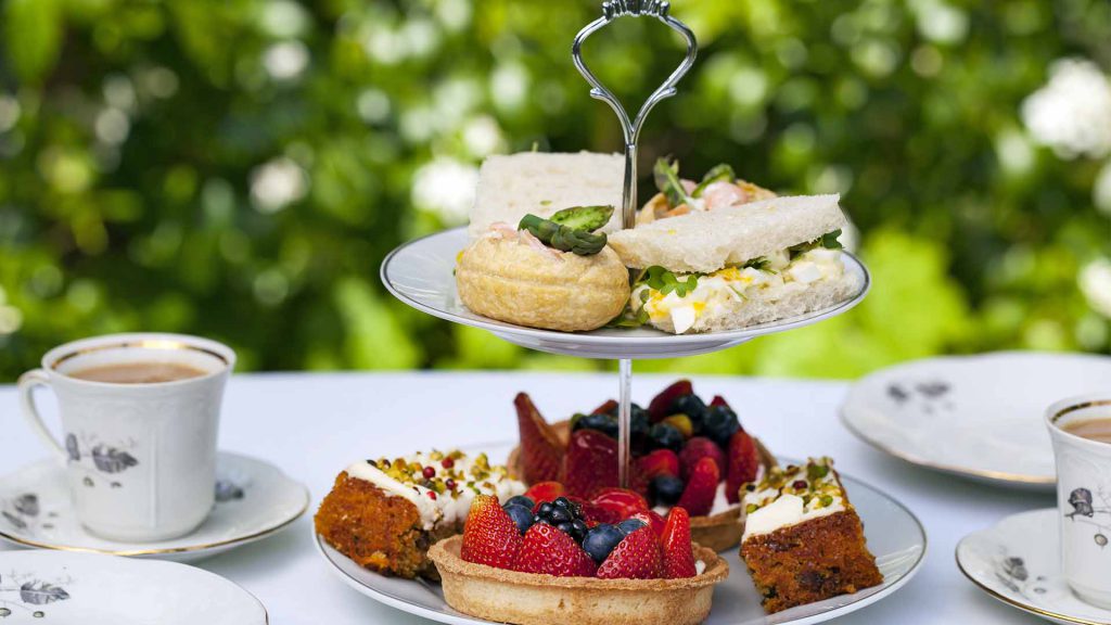 Tier of afternoon tea in the gardens of the Kingsmills Hotel, Inverness