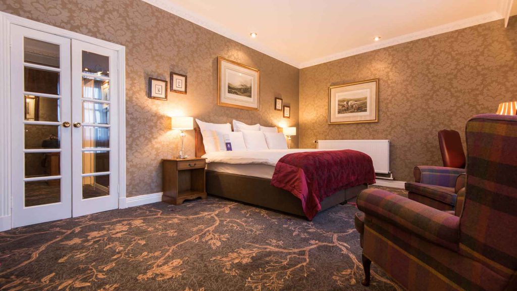Classic room with large double bed at the Kingsmills Hotel