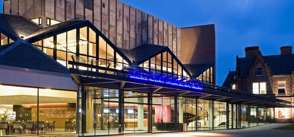 Eden Court Theatre from the outside at night.