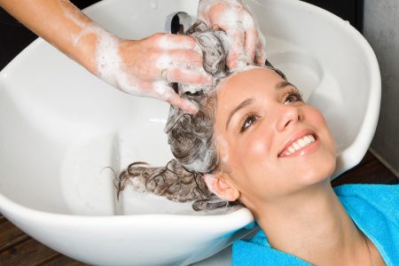 Lady having her hair washed