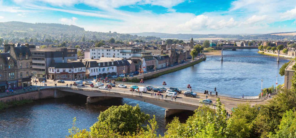 A bridge over the River Ness on a bright day near the Kingsmills Hotel, Inverness