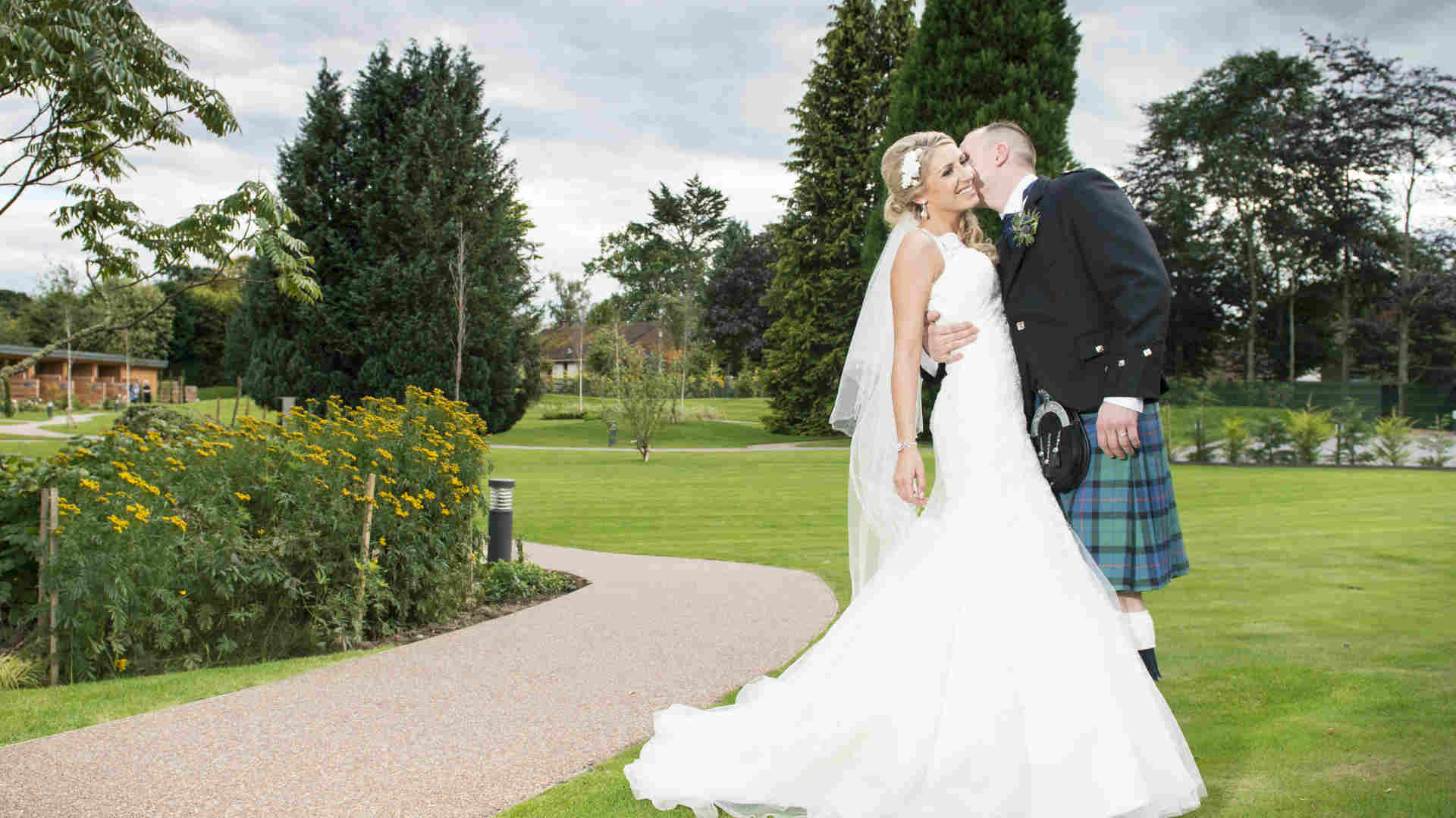 Bride & Groom in Kingsmills Hotel Gardens