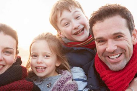 A happy family enjoying being outside on holiday