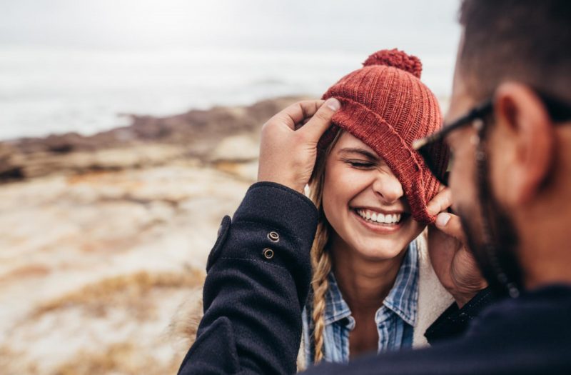 Couple in winter by Loch Ness Laughing