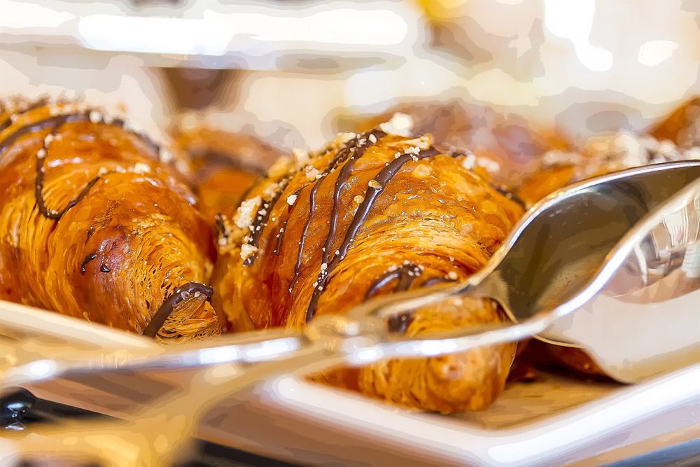 Fresh pastries at hotel breakfast buffet