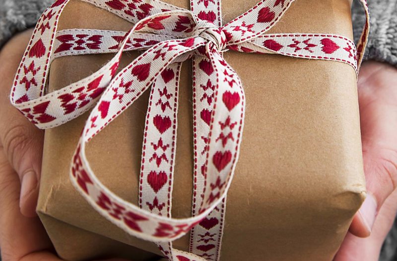 A person holding the best Christmas gift