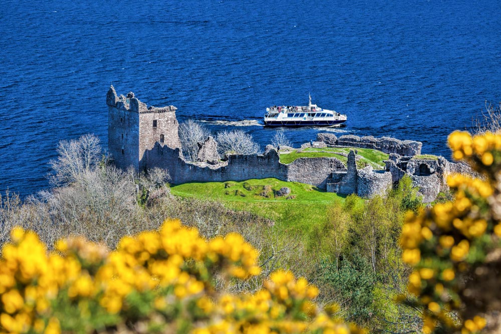 Boat on Loch Ness near Urquhart Castle