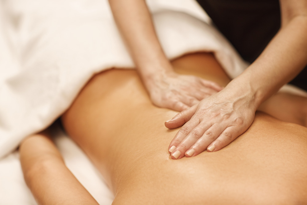Woman having a back massage