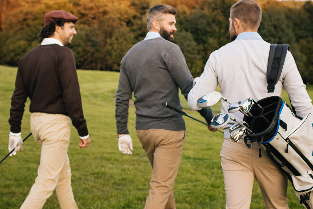 Three friends on golf course