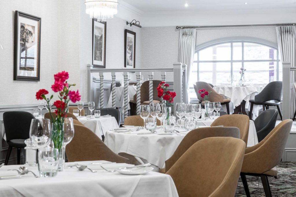 Restaurant with tables set for dinner