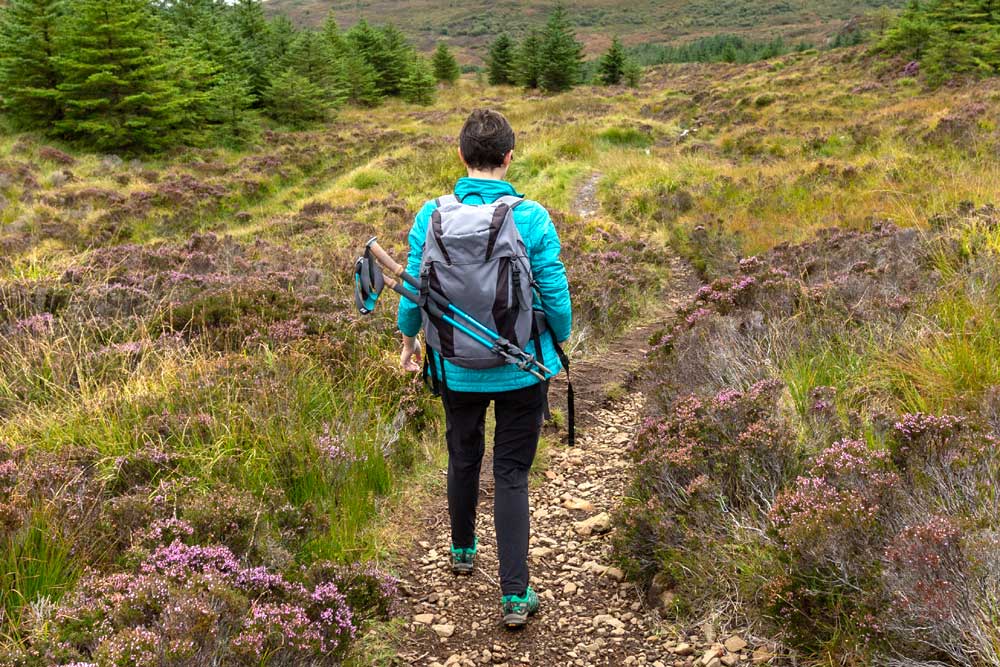Woman hiking in Scotland