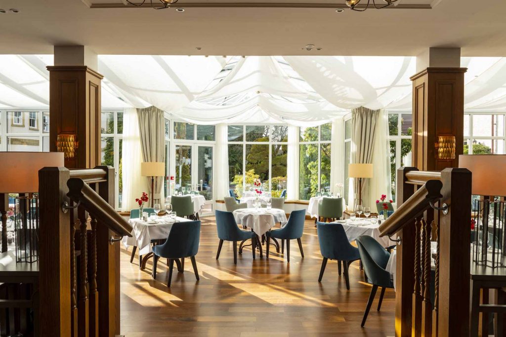 A view down the stairs into the Conservatory restaurant in the Kingmills Hotel