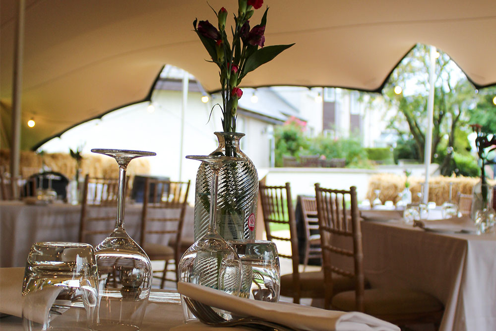 Table set for outdoor dining in Garden Restaurant Inverness
