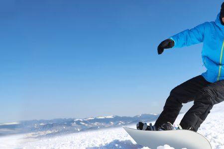 Man snowboarding in winter