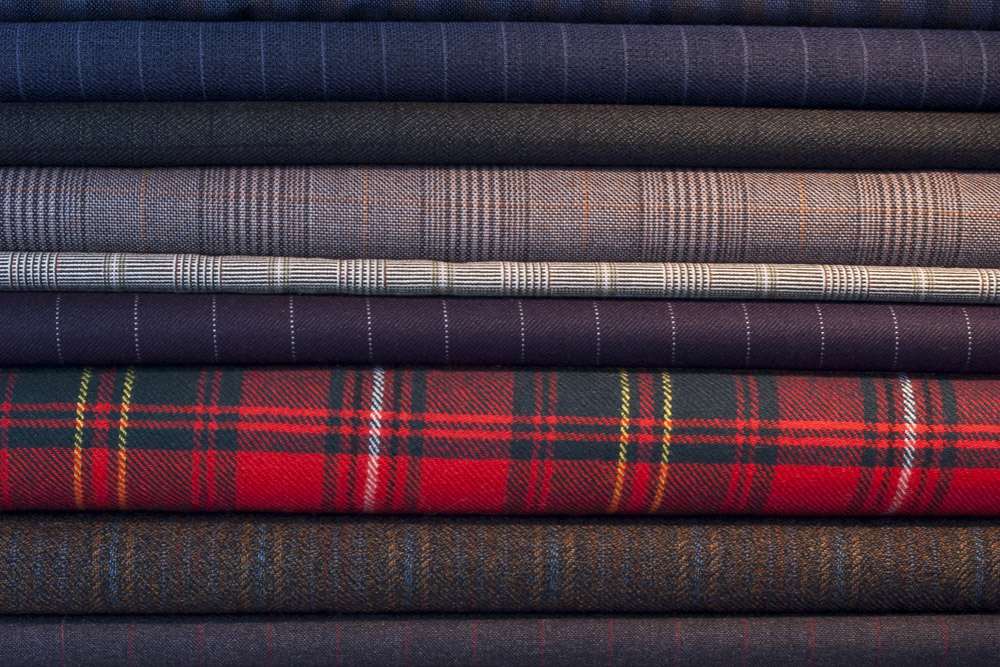 Pile of different fabrics and tartan