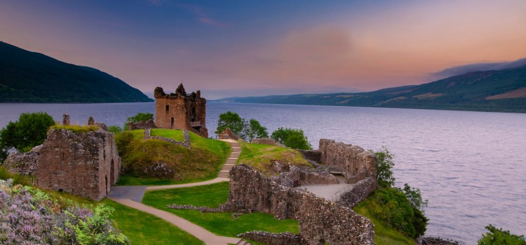 A stunning image of a castle overlooking a Loch