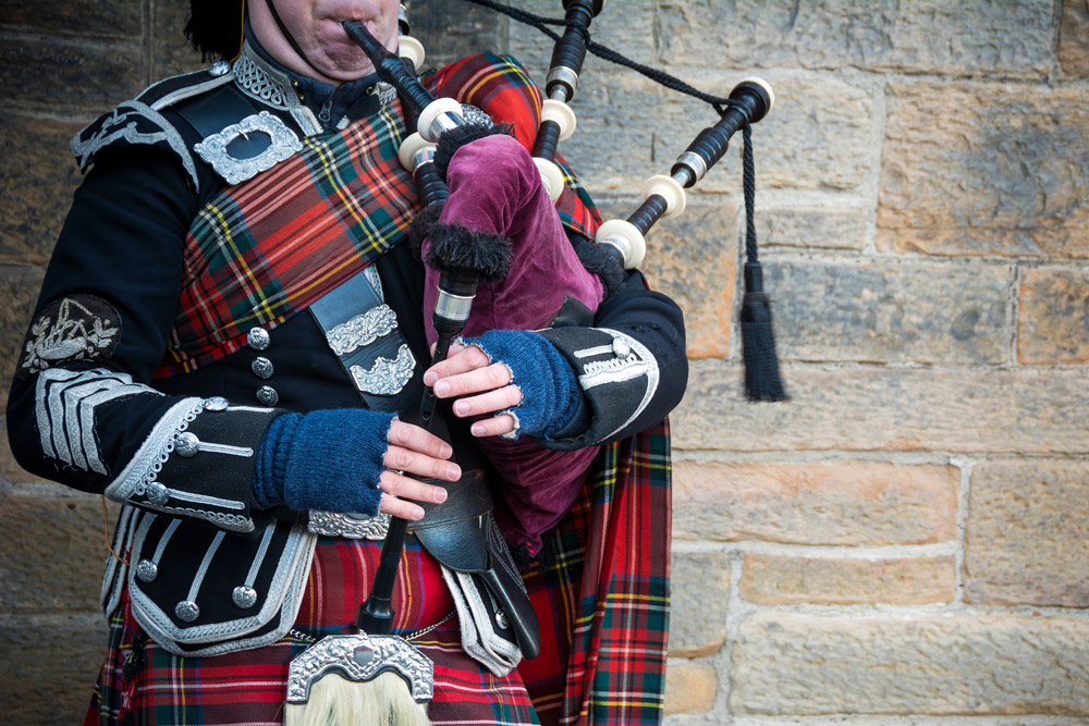 Close up of a piper playing the bagpipes