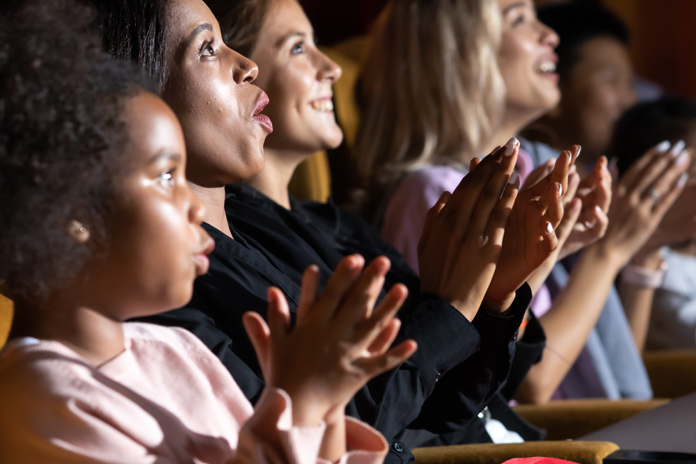 Audience enjoying a show at the theatre