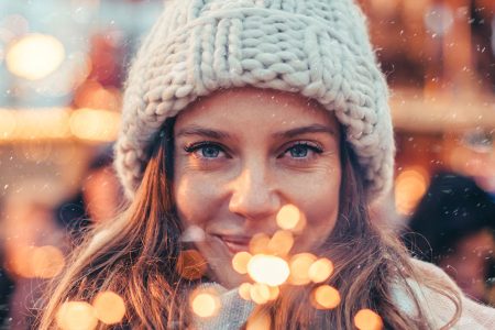 Woman walking through at a Christmas Market