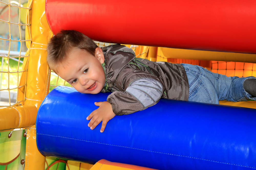Toddler playing at a Soft Play Centre