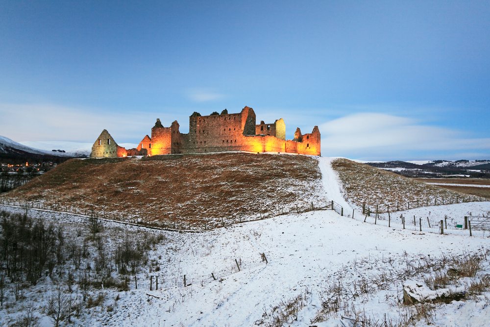 Ruthven Barracks lit up at night in the snow, Newtonmore