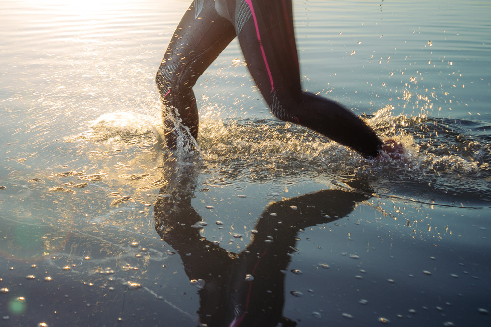 Walking into the water for a swim