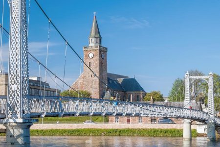 Inverness city with bridge over Ness river in Scotland