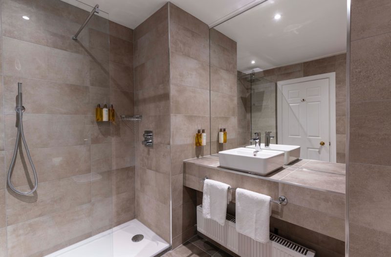 Classic Family Room Bathroom with large shower