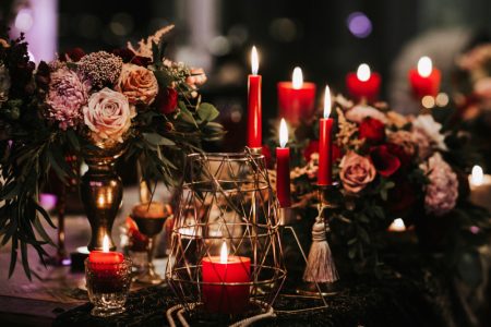 Red candles for a festive wedding celebration