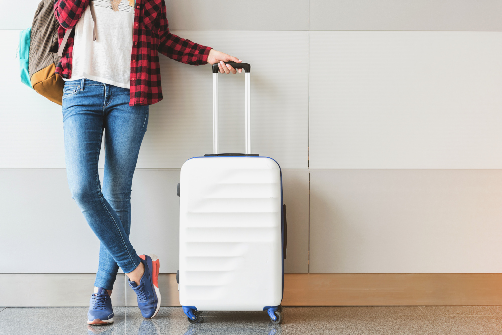 Woman with suitcase in an airport